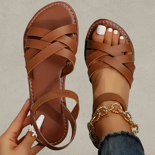 Damensandalen mit gekreuzten Riemen und elastischem Fersenriemen