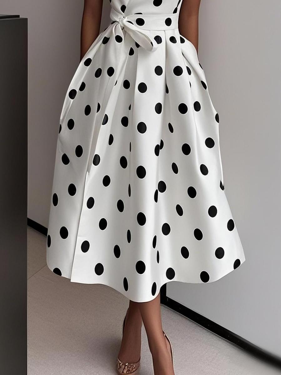 Elegantes Punktekleid für Büro und Freizeit