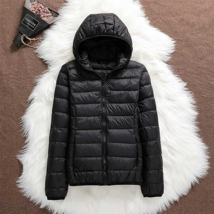 Nord – Neue Jacke mit weißen Entenfedern